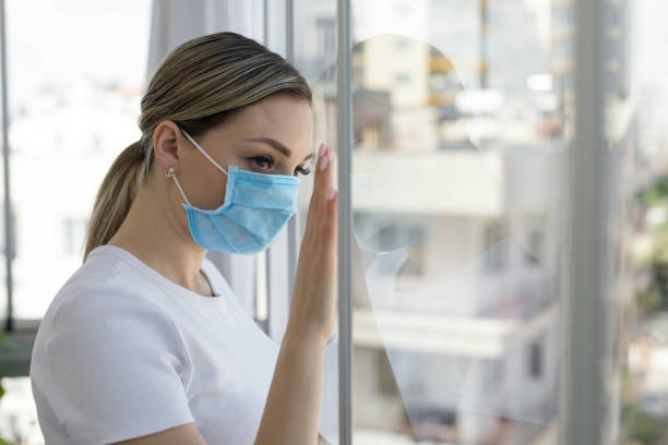 istock Woman in isolation at home 1216649492