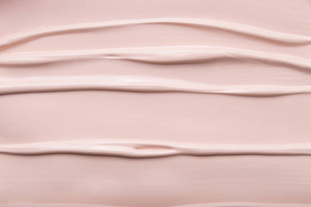 istock Texture of liquid foundation cream background close up 1216649729