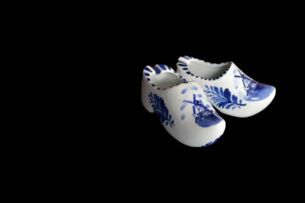 istock white and blue Dutch clogs of porcelain 1216651372