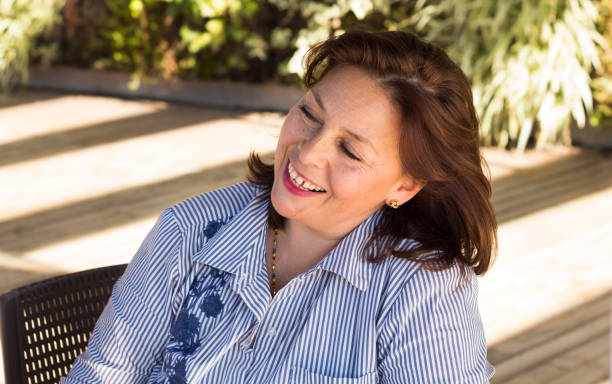 istock Happy mature woman feeling successful and smiling 1216654105