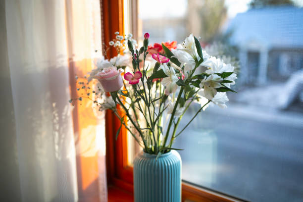 istock Flower bouquet on a window sill 1216655302