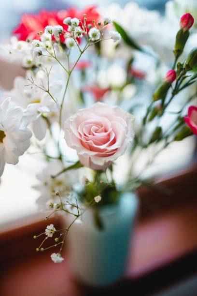 istock Flower bouquet on a window sill 1216655381