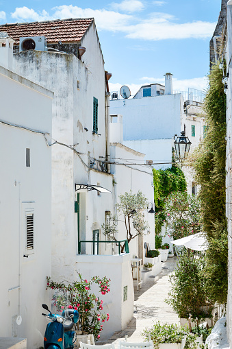 Street view of Ostuni beautiful white town in Puglia, Italy
