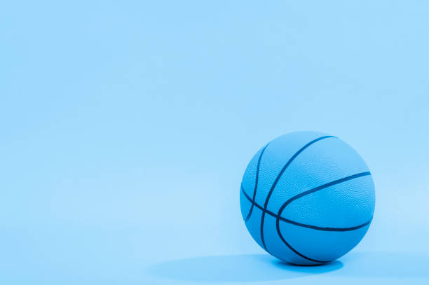 Basketball ball isolated on blue background.