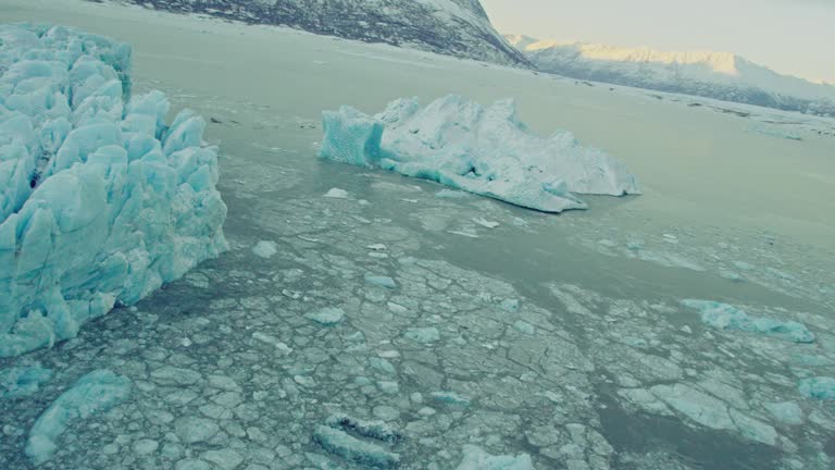 Aerial around an iceberg near Colony Glacier in Alaska