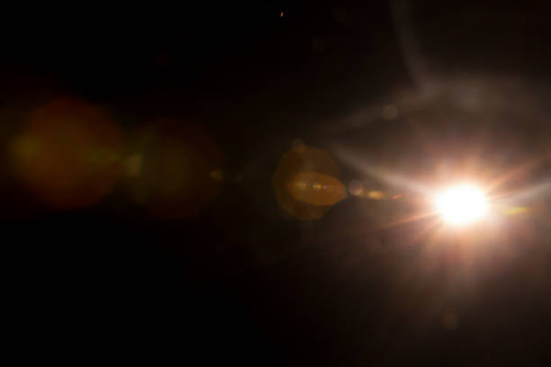 istock Abstract Natural Sun flare on the black 1216660480