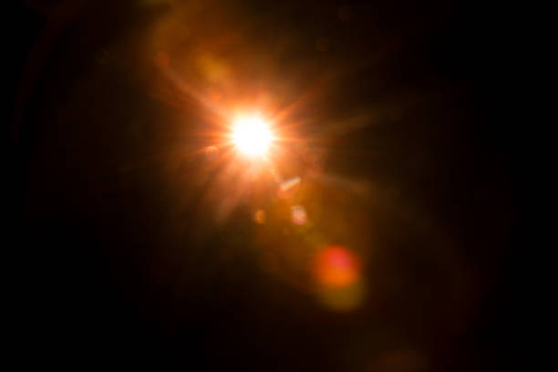 istock Abstract Natural Sun flare on the black 1216660484