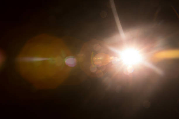 istock Abstract Natural Sun flare on the black 1216660503