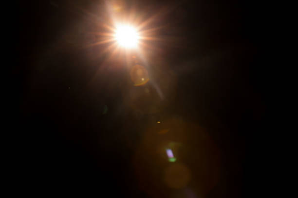 istock Abstract Natural Sun flare on the black 1216660509