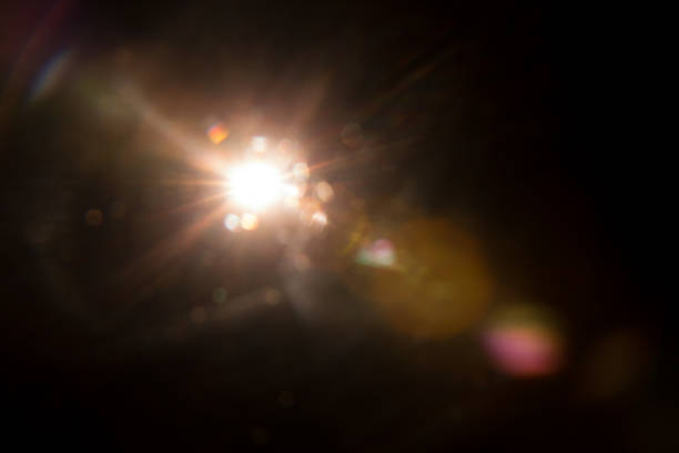 istock Abstract Natural Sun flare on the black 1216660517