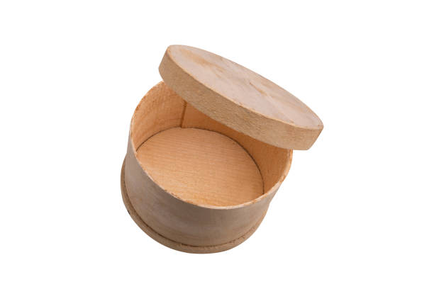 istock Opened natural wooden round box isolated on white background 1216660520