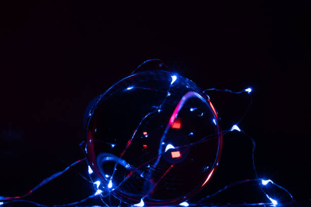 istock one perfect glass ball is illuminated by coloured lights 1216660554