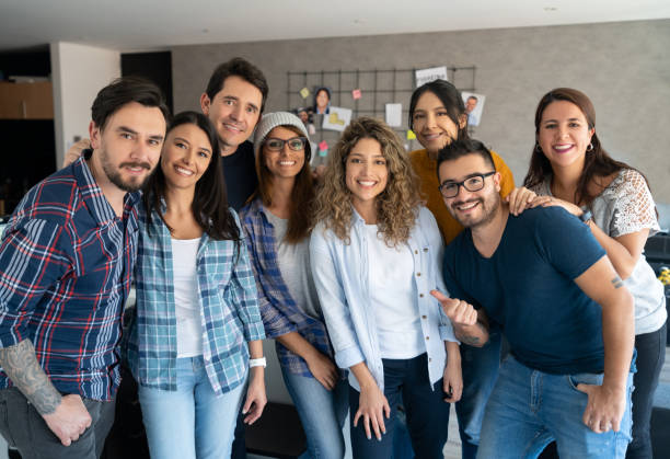 istock Happy group of designers at a creative office 1216664741