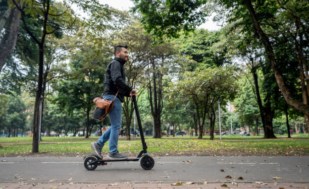 istock Man riding a scooter at the city 1216664781