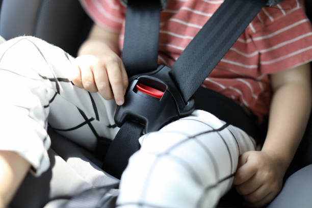istock Happy boy is secure in a baby car seat 1216665299