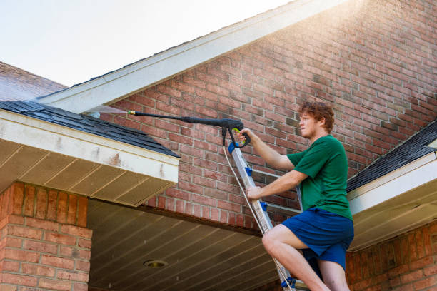 istock Pressure Washing a Brick House 1216666431