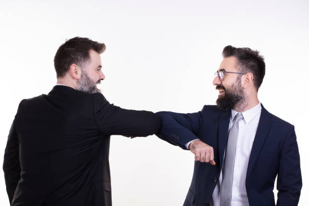 Young happy employee talking with his boss