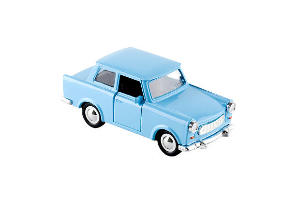 blue spielzeugauto-trabant, isoliert auf weiss - spielzeugauto stock-fotos und bilder