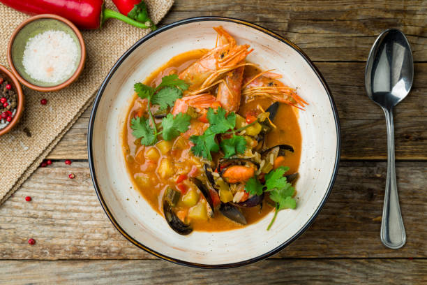 istock Seafood casserole bowl on wooden table 1216670071