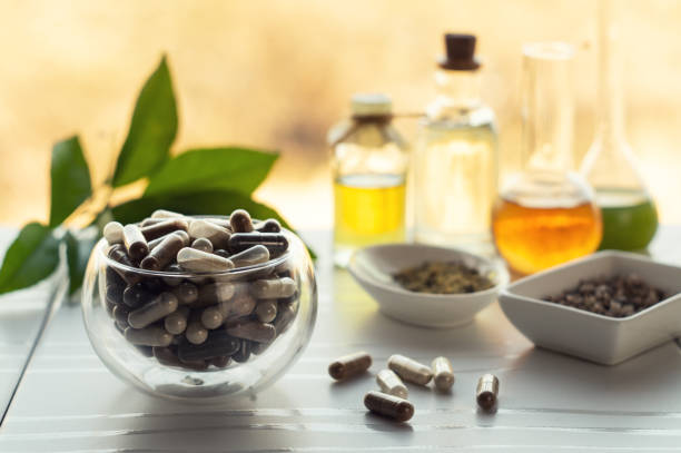 istock Capsules with dietary supplements and ingredients 1216670235