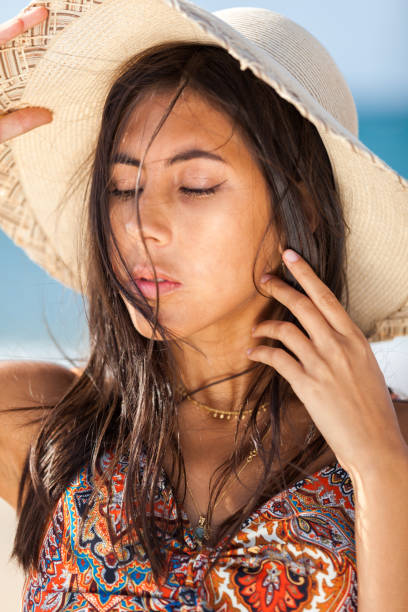 istock WOMAN ON THE BEACH 1216670308