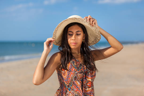 istock WOMAN ON THE BEACH 1216670349