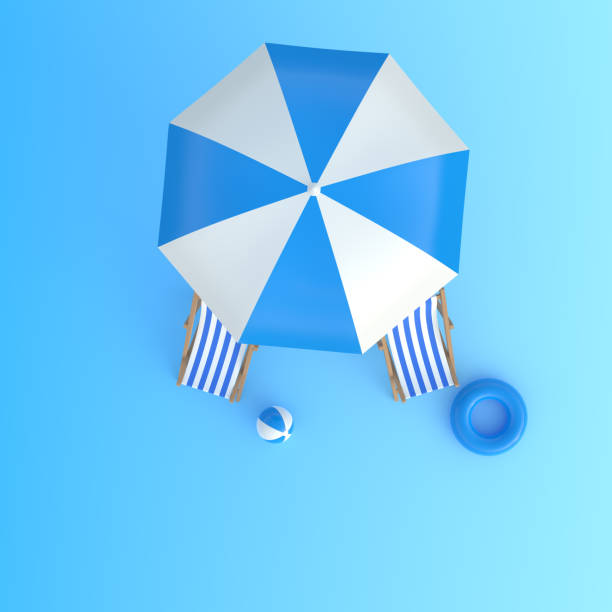 istock Beach umbrella with chairs and beach accessories on the bright blue background 1216672703