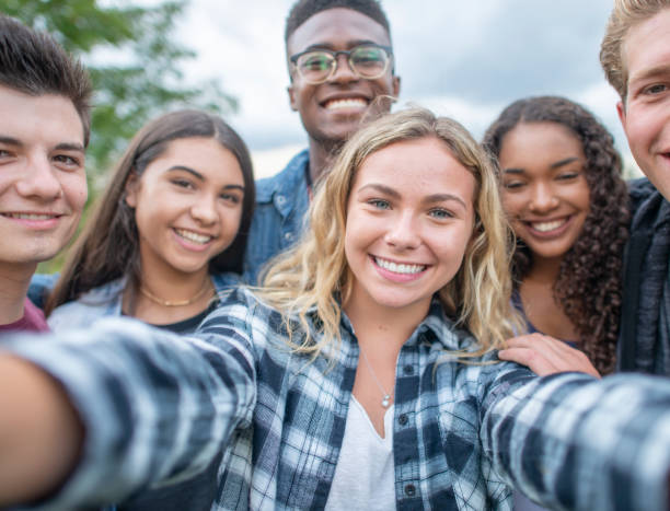 istock University Students Taking a Selfie stock photo 1216674081