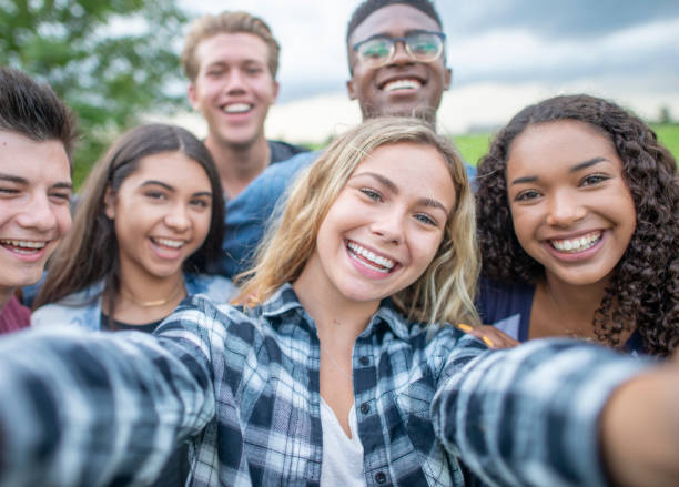 istock University Students Taking a Selfie stock photo 1216674095