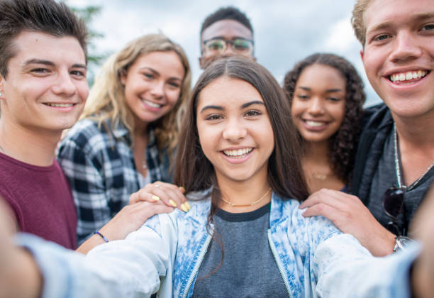 istock University Students Taking a Selfie stock photo 1216674108