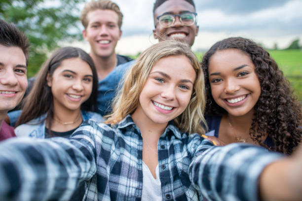 istock University Students Taking a Selfie stock photo 1216674113