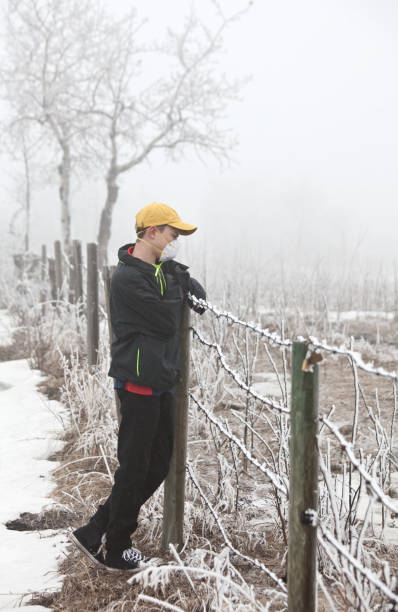 istock Young Caucasian Boy With Protective Mask On During Covid-19 Pandemic 1216675921