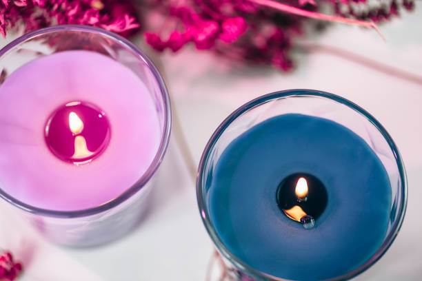 istock Aromatic Purple and Blue Scented Candles with Lavender Decoration 1216679419