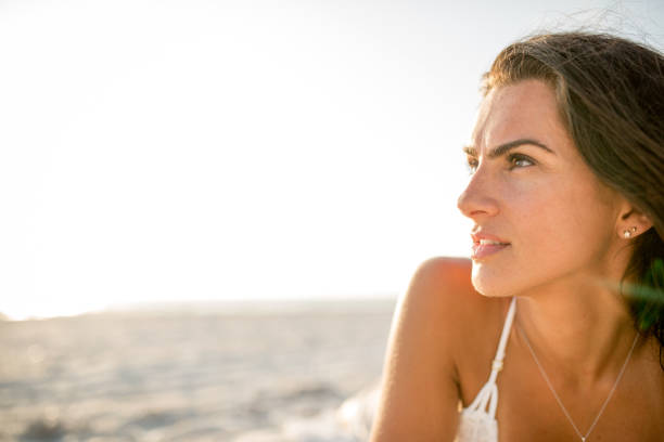 istock Female enjoying the beach 1216681801