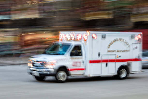 istock Ambulance Speeding in Chicago, Coronavirus Danger, Blurred Motion 1216682438