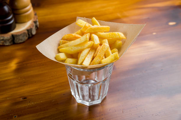 istock french fries on wooden table 1216682458
