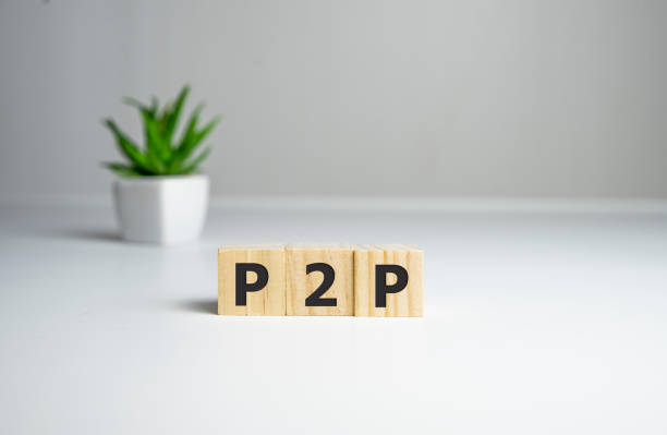 close-up of a p2p word on wooden blocks - peer to peer imagens e fotografias de stock