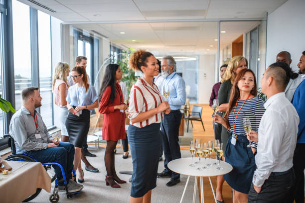 istock Diverse Group of Work Colleagues Enjoying Office Party 1216687254