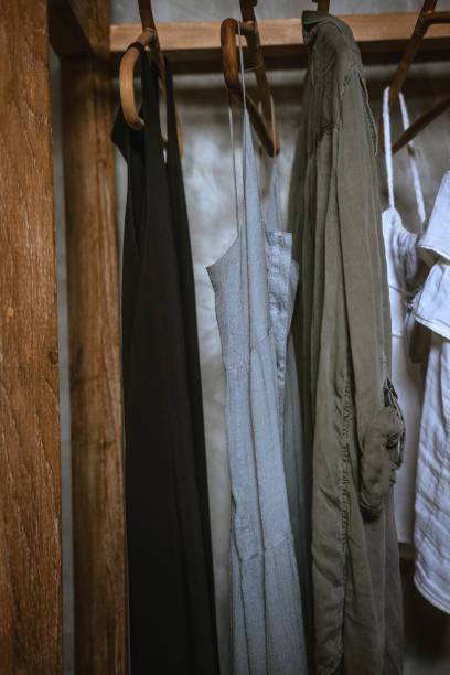 istock Boho chic open wooden clothing rack 1216694183