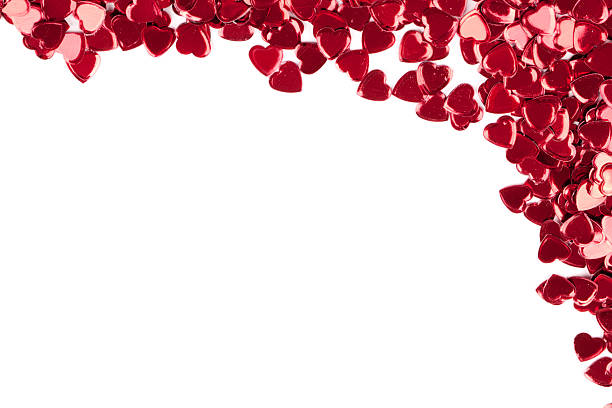 sfondo coriandoli cuori di san valentino rosso - heart shape confetti small red foto e immagini stock
