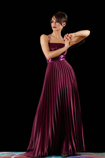 Woman in Purple Dress Looking to Mountains Sea