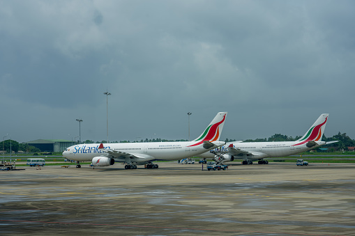 Colombo / Sri Lanka - August 2019:  Two Airbus A330 from Srilankan being services ojn the apron at Colombo Airport