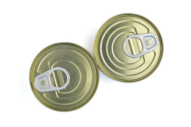 istock Two aluminum shiny tin cans without label isolated on a white background. Top view. 1216713930