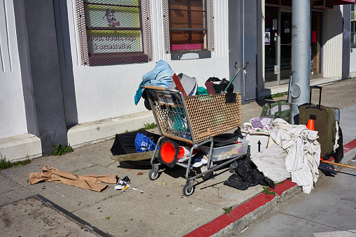San Francisco, CA, USA - Feb 9, 2020: Homeless belongings seen on the sidewalk in the SoMa neighborhood in San Francisco, California.