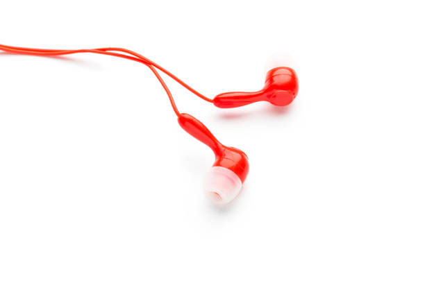 istock Modern wired classic red headphones isolated on white Modern technology concept 1216719955