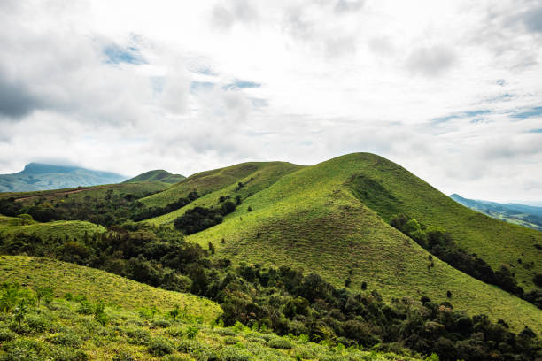 istock mountain with green grass and beautiful sky 1216722228