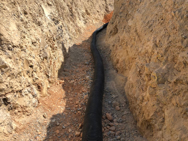 istock The high voltage electrical cable is laid in a trench 1216722279