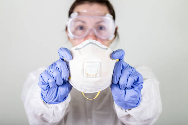 istock Doctor in protective wear in studio, Coronavirus COVID-19. 1216722301