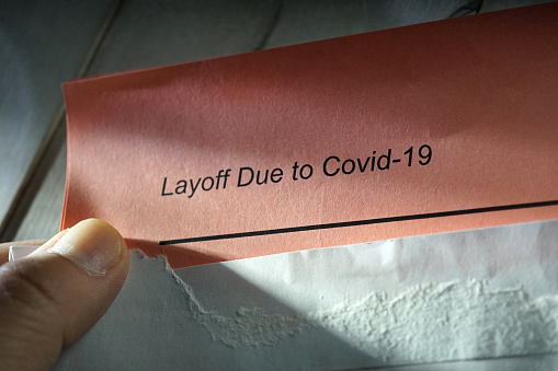 shot of the word coronavirus layoff letter