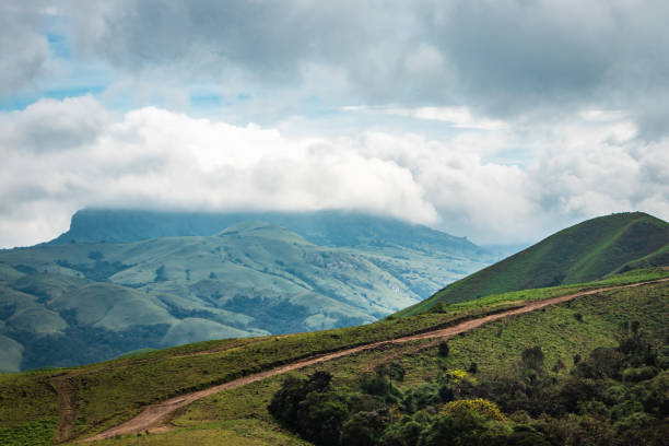 istock mountain with green grass and beautiful sky 1216723168